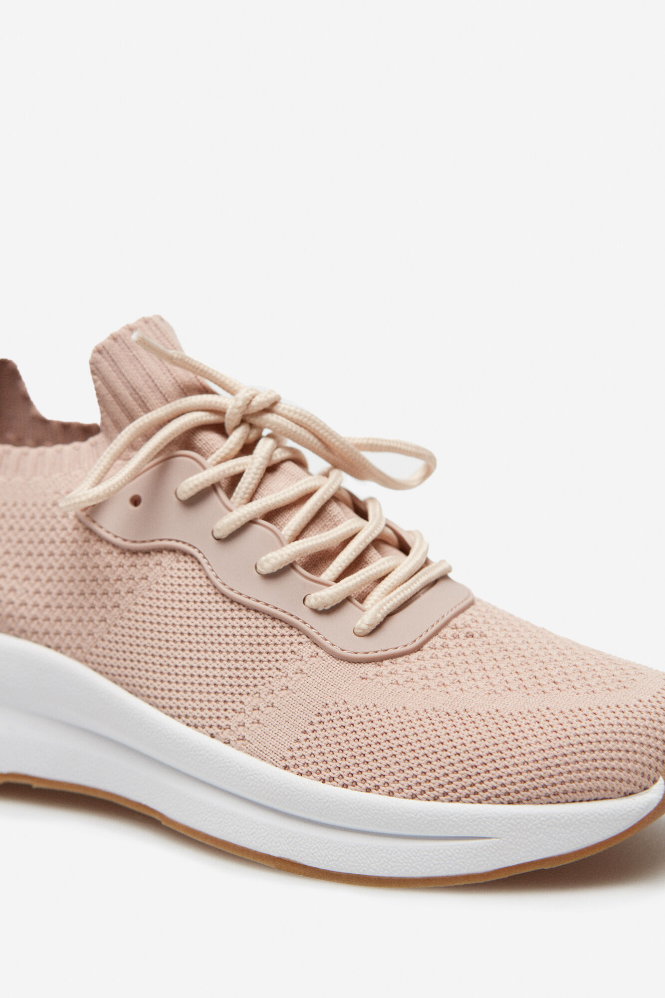 Flyknit trainer discount rose