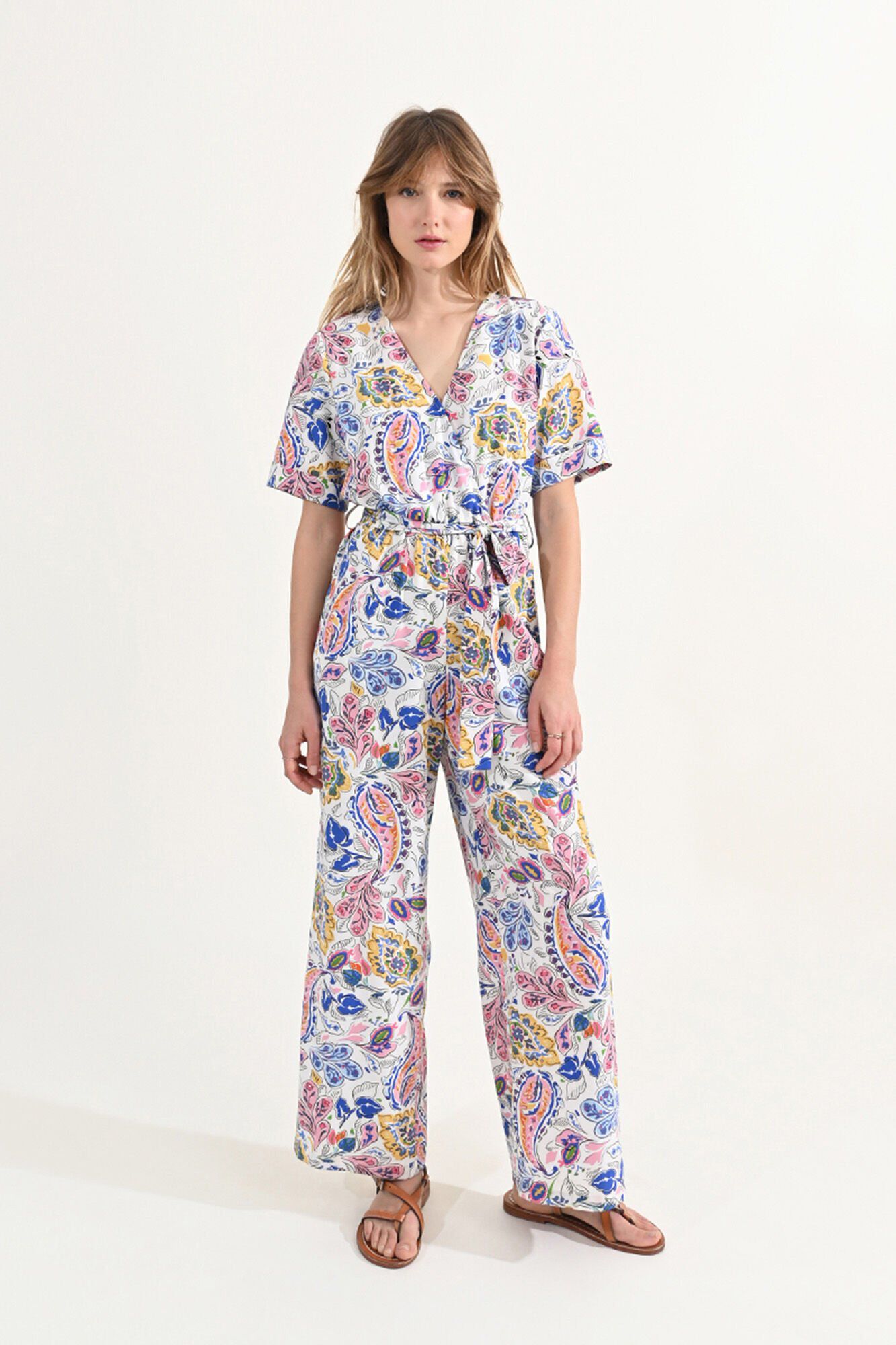 Women s long jumpsuit with printed motif and tie detail Women s jumpsuits Cortefiel