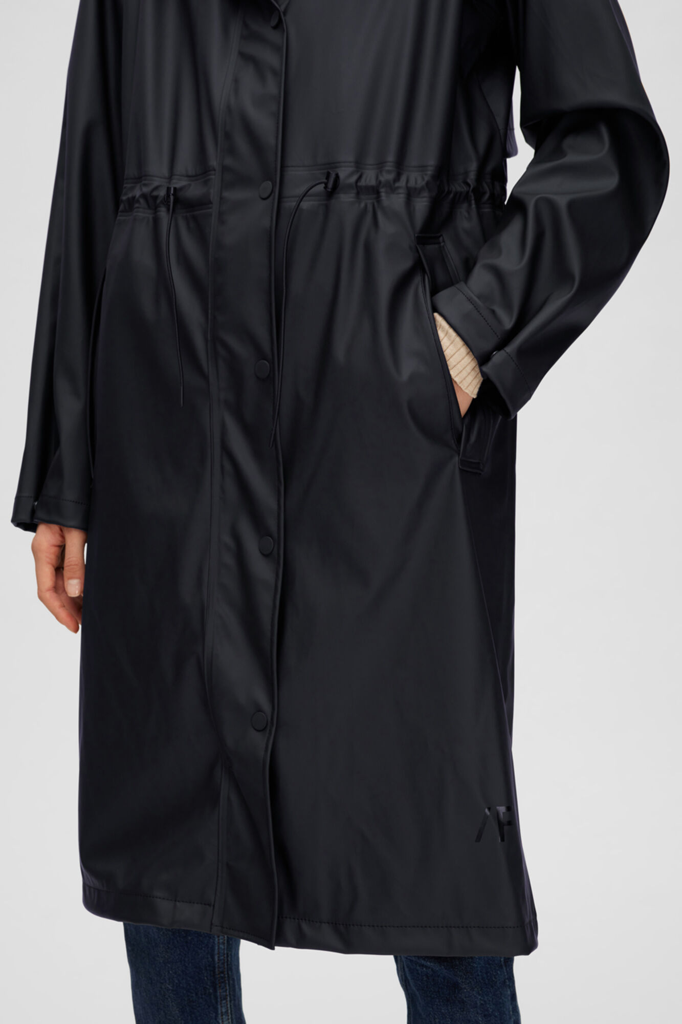 Raincoat with hood and adjustable waist. Women s coats and parkas Cortefiel