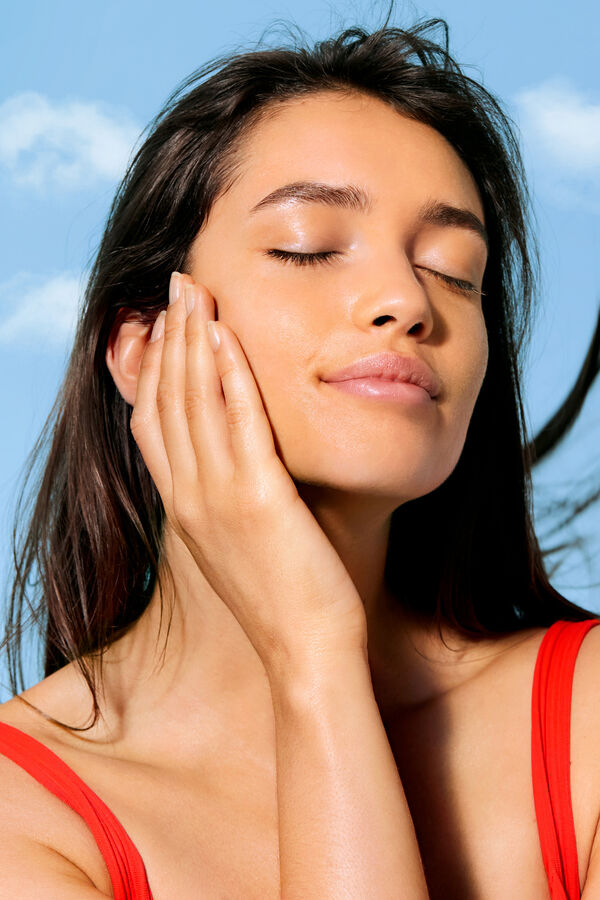 Cortefiel Nuxe Sun leite solar fluido alta proteção para rosto e corpo FPS 50 Laranja