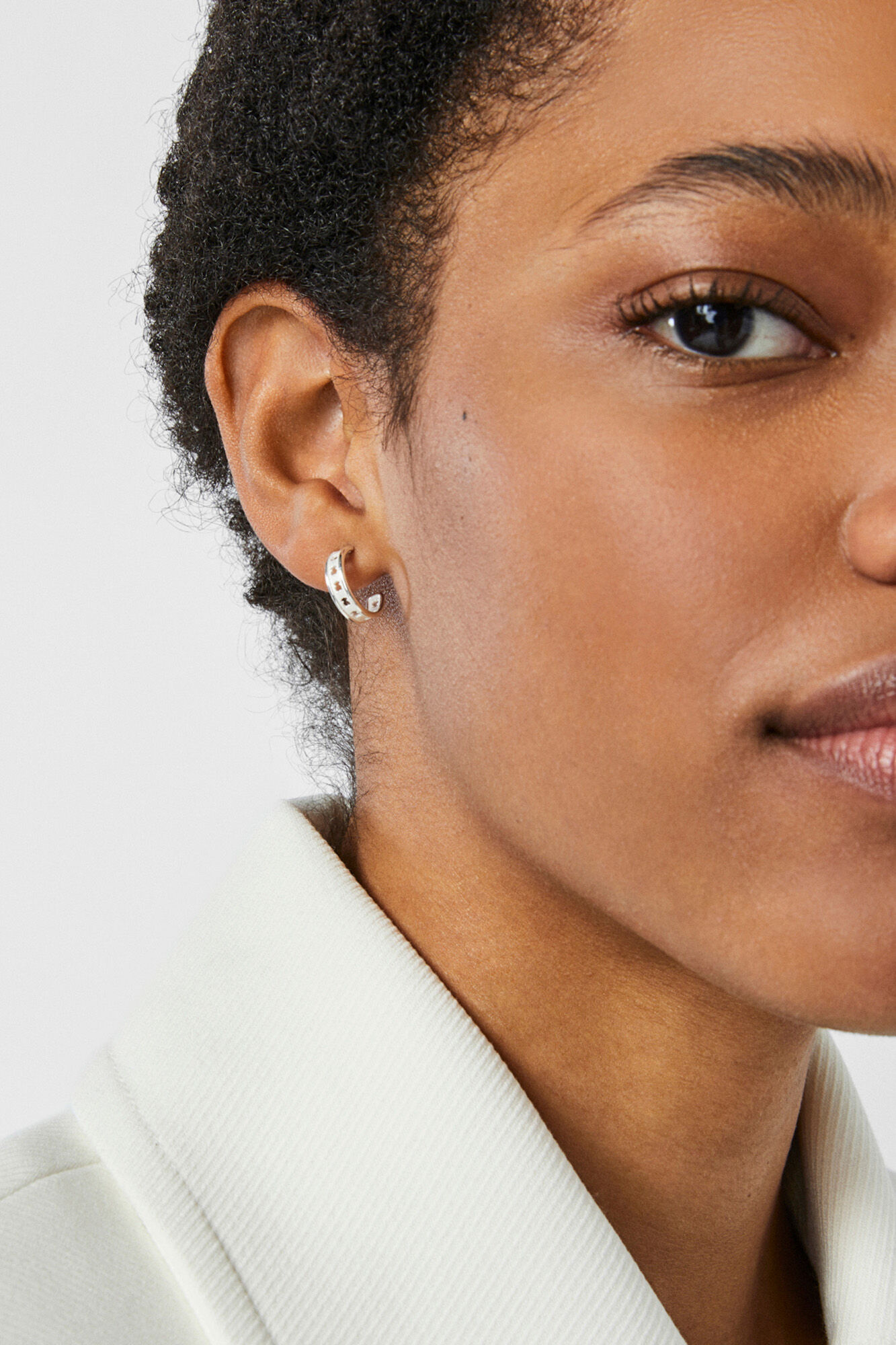 Small silver hoop earrings with a TOUS Bear Row silhouette Women s accessories Cortefiel