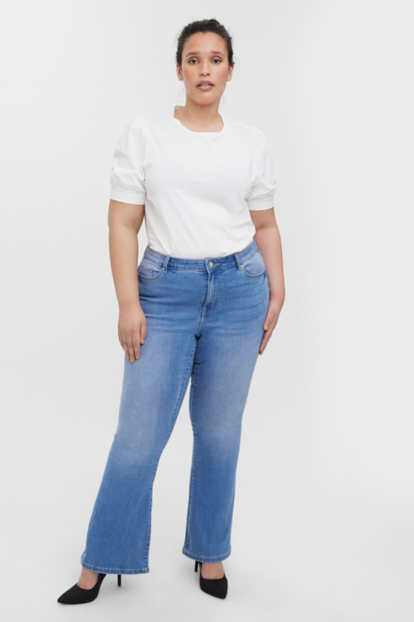 Pantalones vaqueros tipo campana de mujer | Nueva Colección | Cortefiel