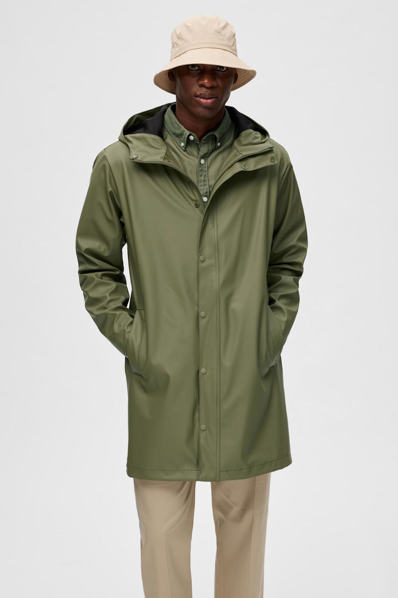 Waterproof raincoat with hood. Men s coats Cortefiel