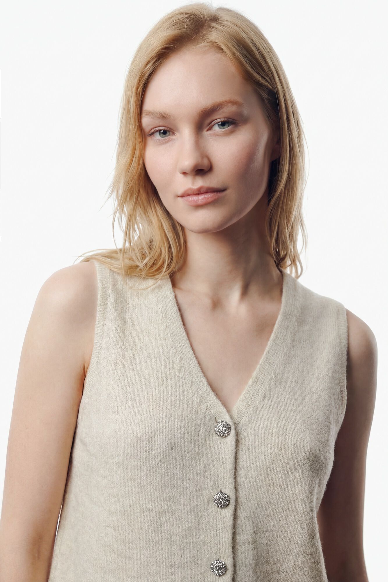 Vila Malha de colete com bot&otilde;es de joia