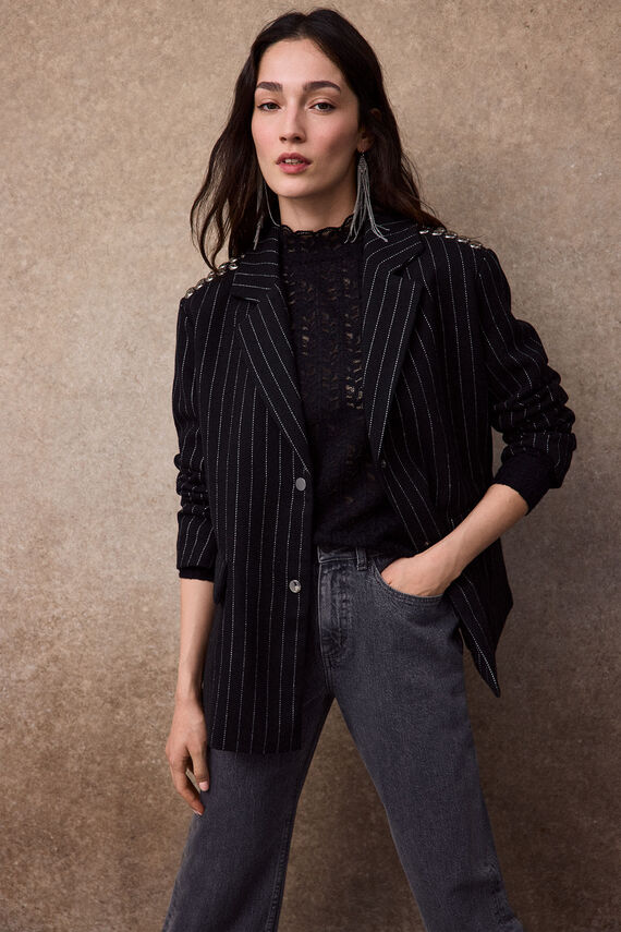 Americana con tachas