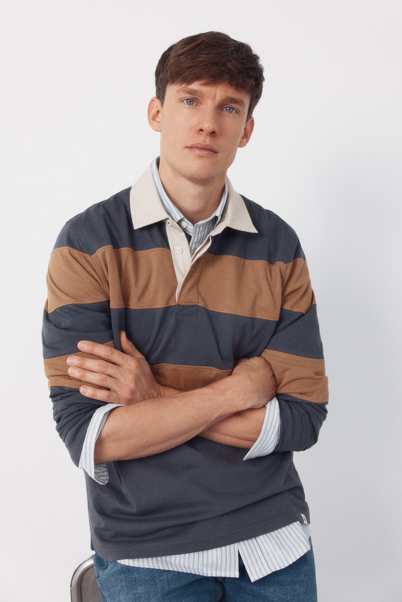 Cortefiel <br>-Regular fit<br>-Striped single jersey fabric<br>-Contrasting neck and placket with buttons<br>-By purchasing our cotton products, you are supporting our investment in the Better Cotton initiative. This product has been obtained through a mass balance 