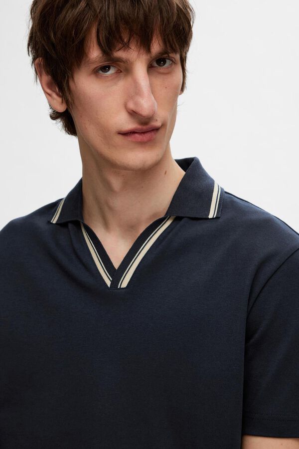 Selected short sleeve V- neck polo shirt made from 100% organic cotton.  Navy