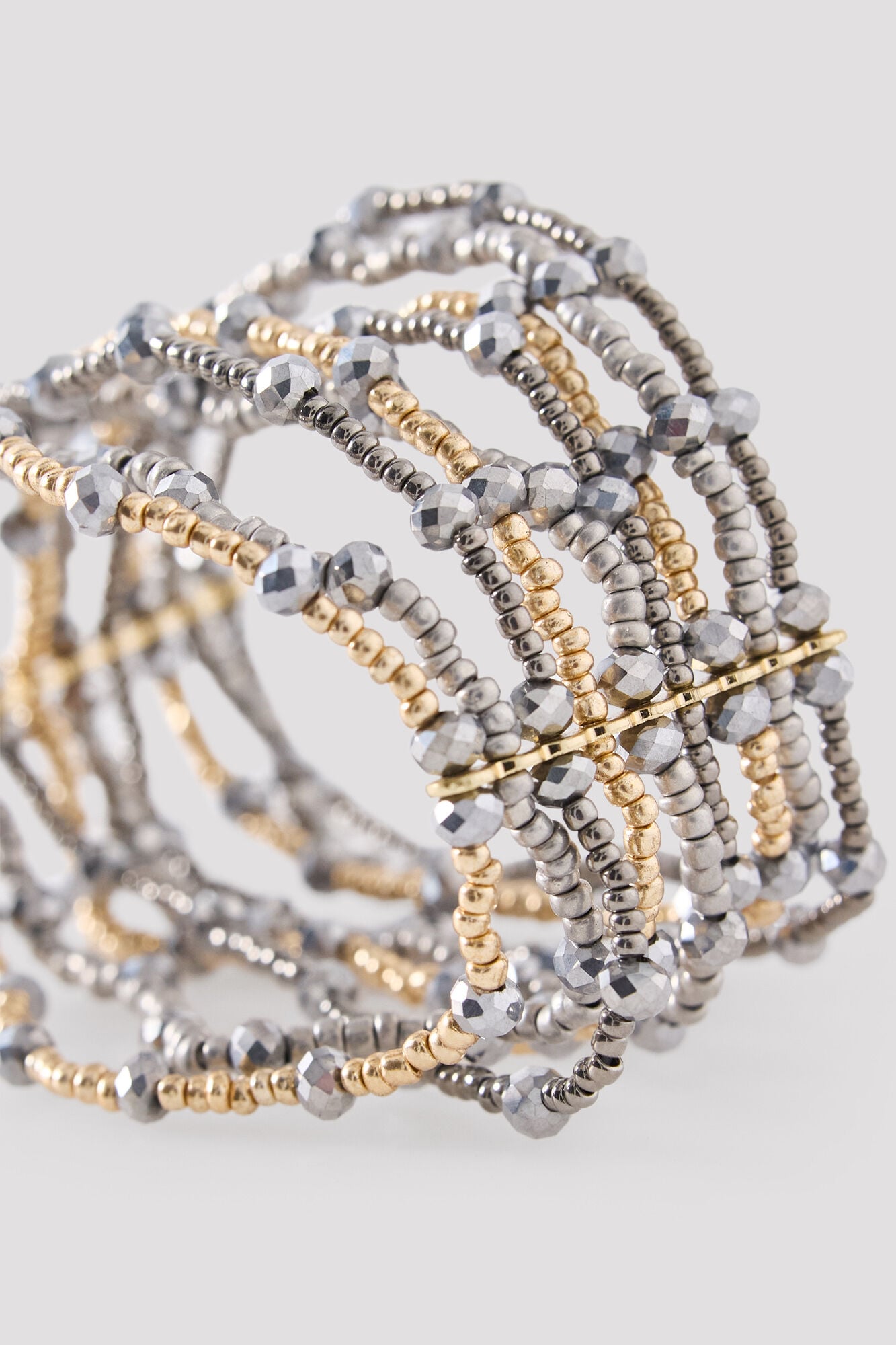 Cortefiel Pulsera cristales metalizados