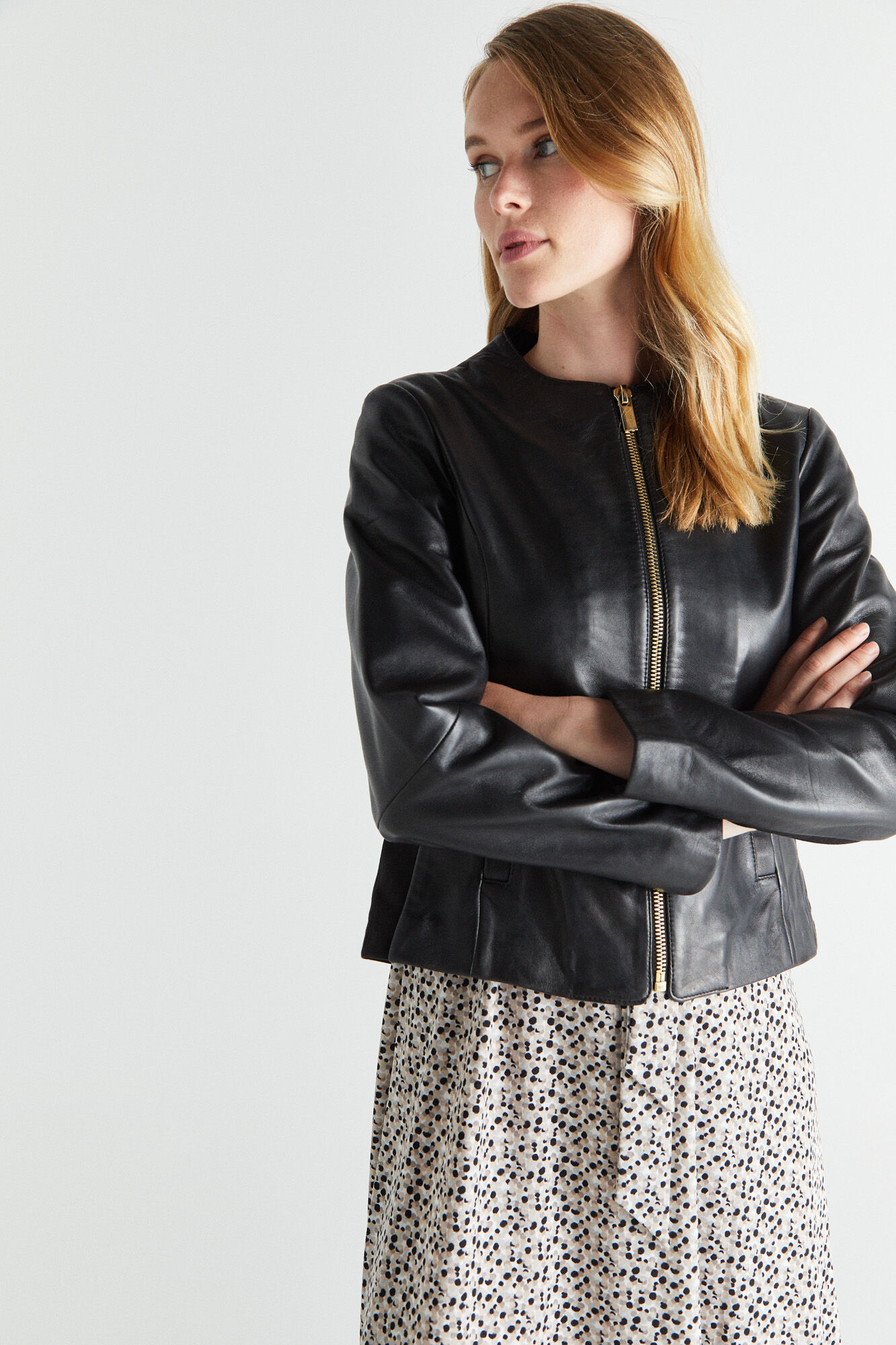 Cazadora de piel combinada punto Chaquetas de mujer Cortefiel