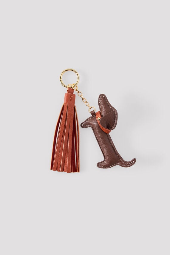 Charm perro borla