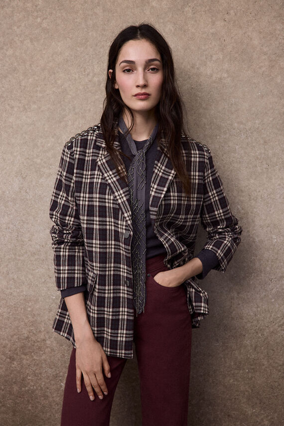 Americana con tachas