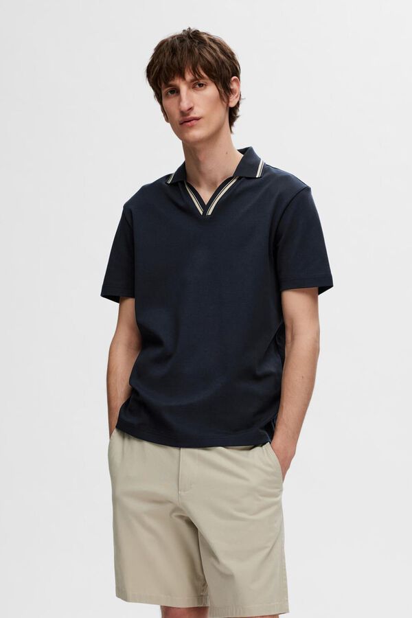 Selected short sleeve V- neck polo shirt made from 100% organic cotton.  Navy