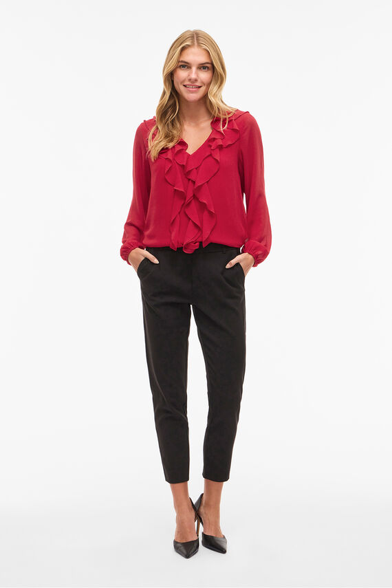 Blusa de manga larga con volantes