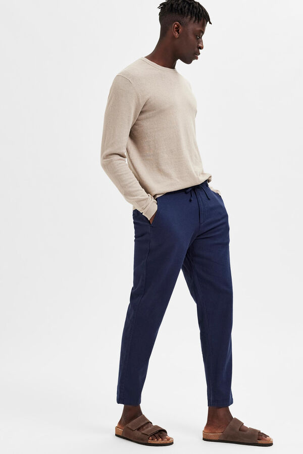 10 pantalones de lino de Cortefiel básicos para vestir cómoda y elegante:  no marcan y son holgados