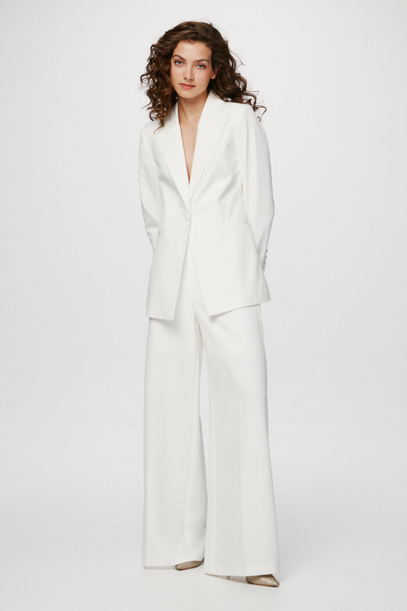 Pantalon pata de elefante blanco on sale