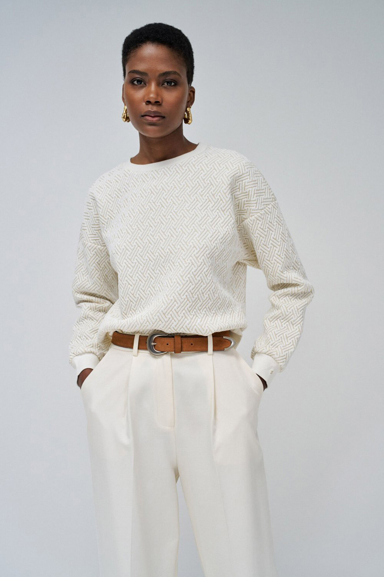 Jersey de punto texturizado con brillo Jerseis y cardigans de mujer Cortefiel