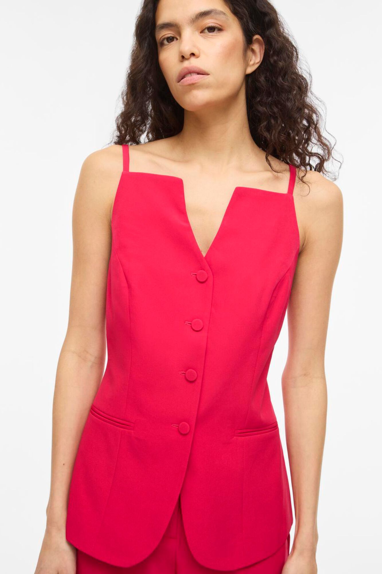 Vila Colete abotoado de al&ccedil;as