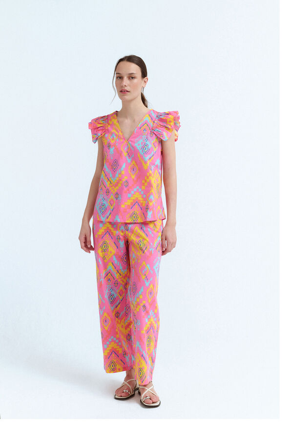 Vila Calças com estampado étnica ikat Subiu