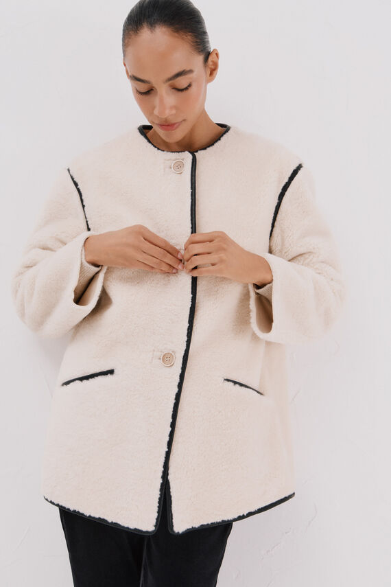 Chaquetón efecto doble faz vivos