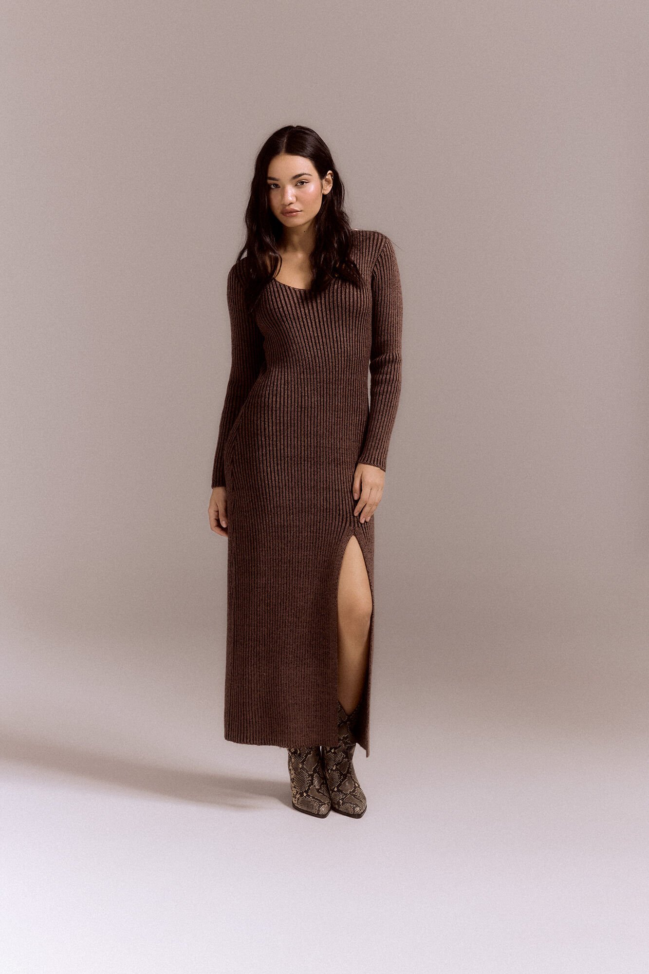 Ribbed jersey knit dress with slit Women s dresses and jumpsuits Cortefiel