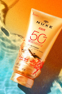 Cortefiel Nuxe Sun leite solar fluido alta proteção para rosto e corpo FPS 50 Laranja