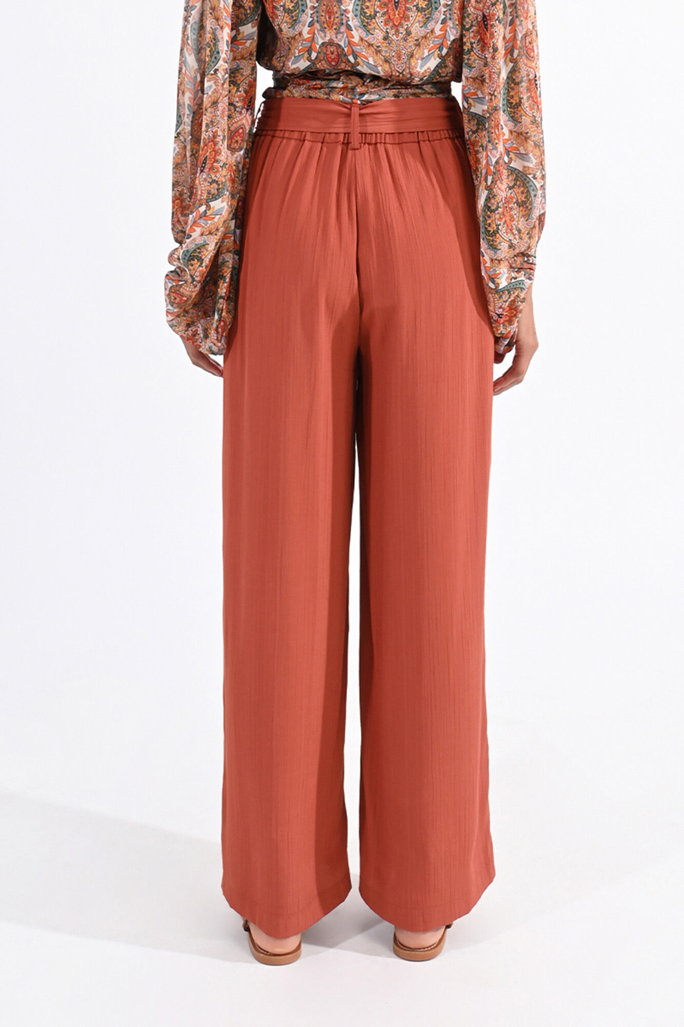 Pantalon de mujer largo con lazada y pliegues Pantalones de mujer Cortefiel