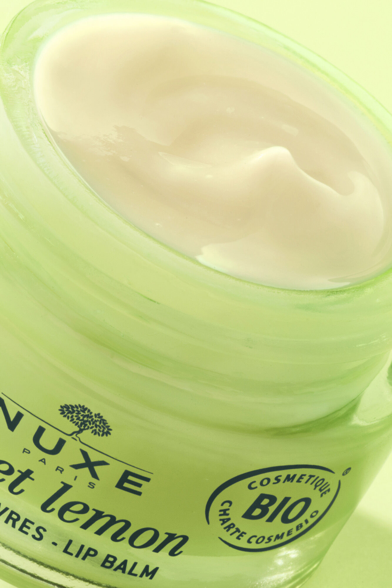 Nuxe B&aacute;lsamo labial hidratante con fragancia de merengue de lim&oacute;n