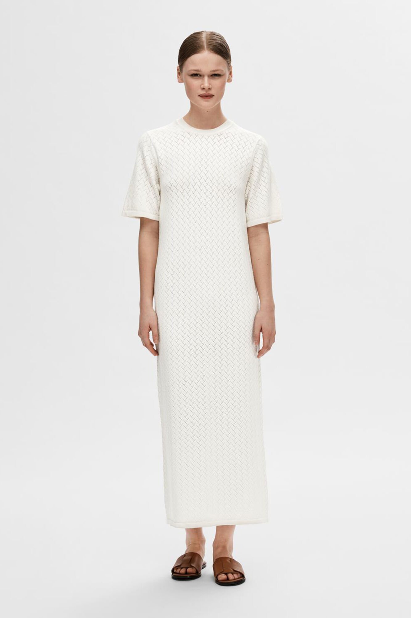 Short sleeve jersey knit midi dress made with Ecovero viscose. Women s dresses and jumpsuits Cortefiel