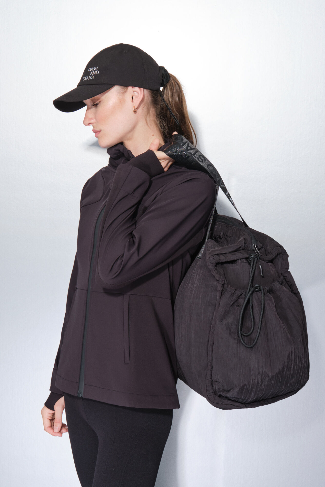 Dash and Stars Bolso viaje nylon negro satinado