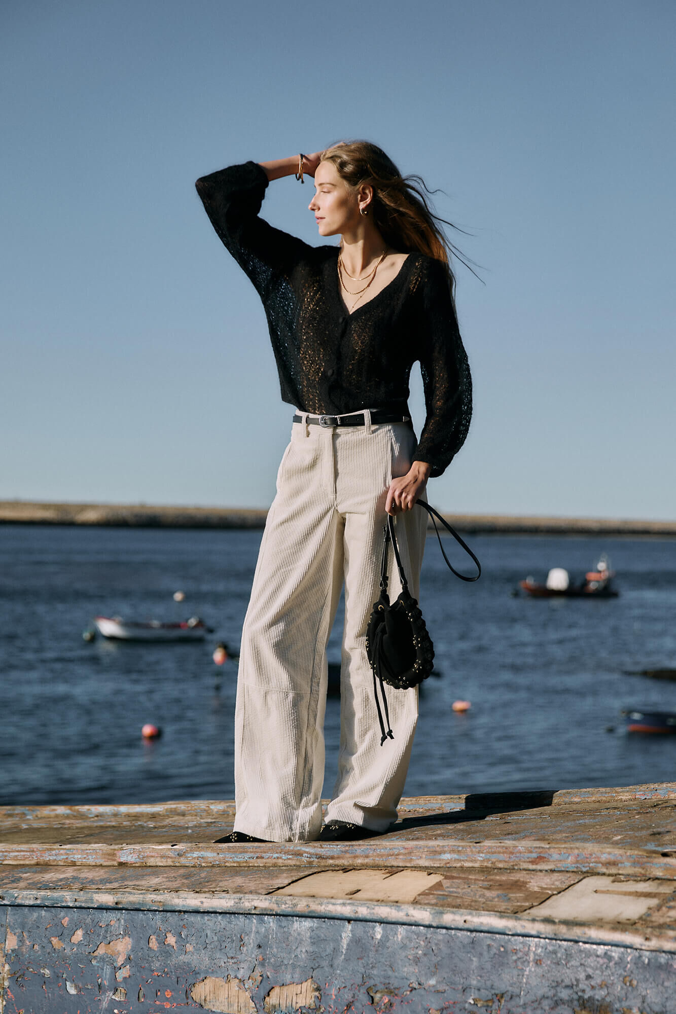 Hoss Intropia Ivy. Casaco de malha vazado