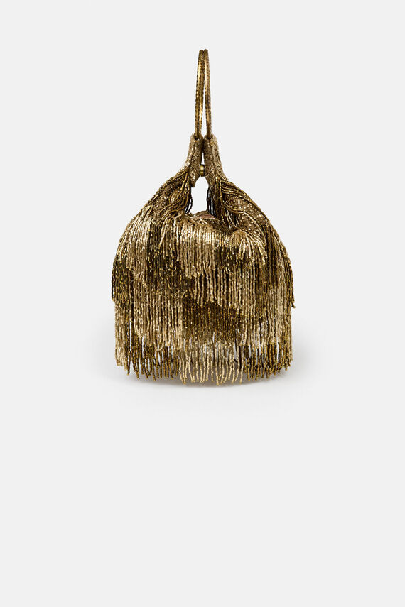 Natalia. Bolso con anillas y flecos