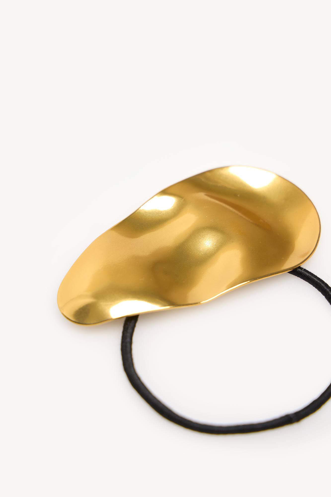 Hoss Intropia Leticia. Peda&ccedil;o de el&aacute;stico de cabelo