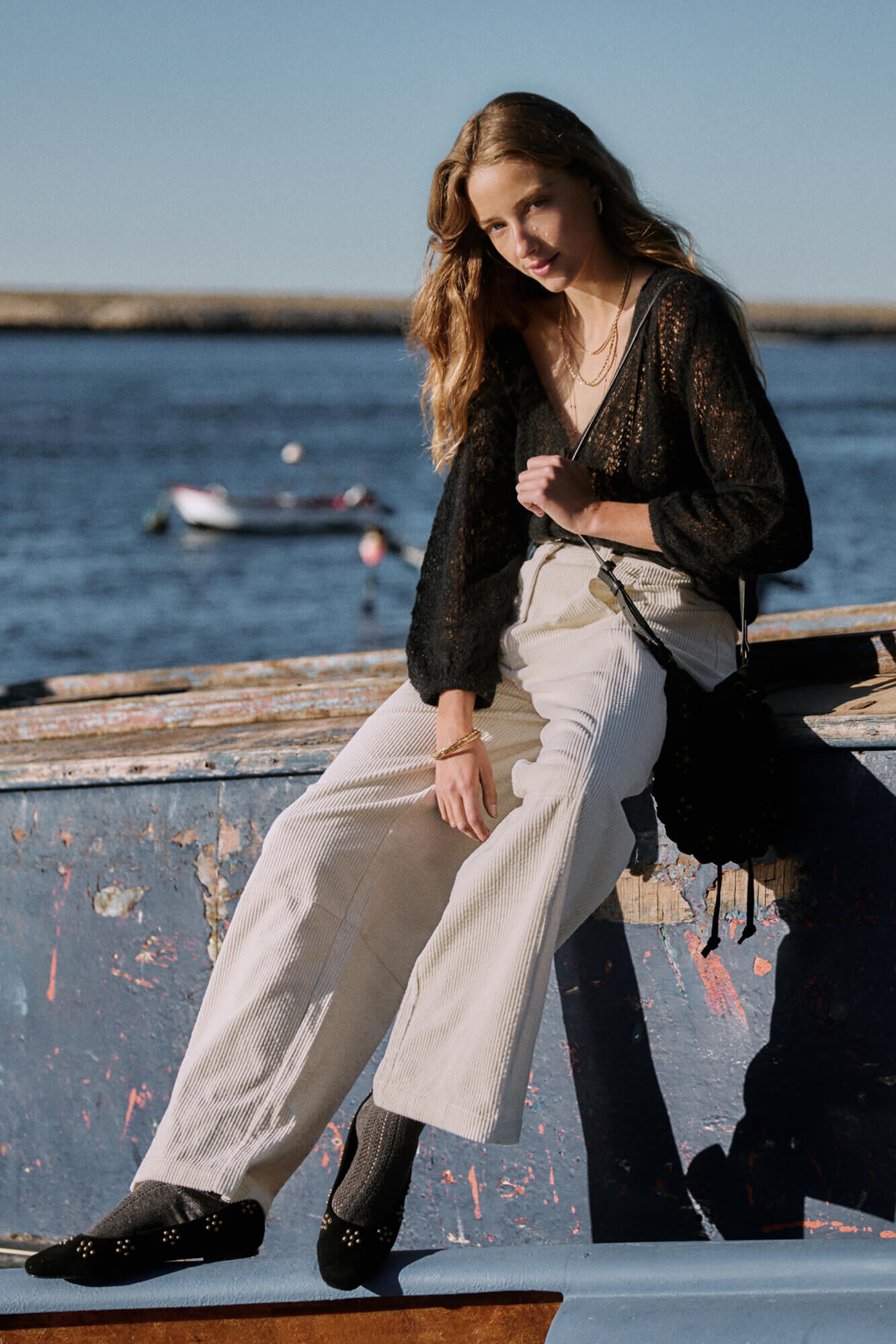 Hoss Intropia Ivy. Casaco de malha vazado