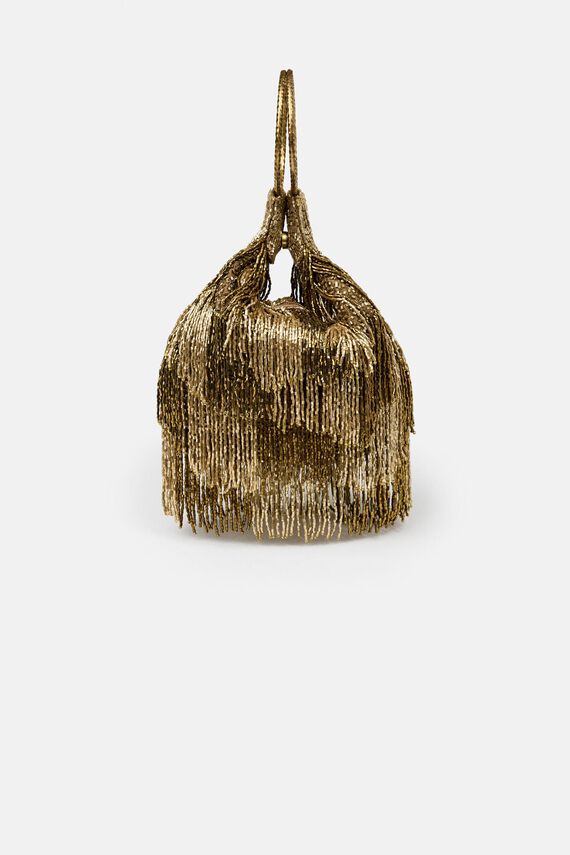 Natalia. Bolso con anillas y flecos