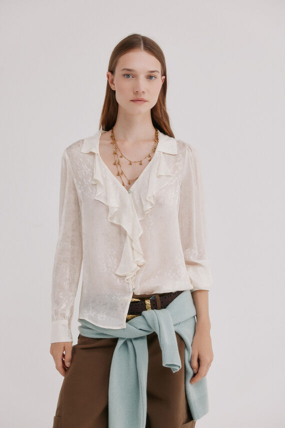 Calyx.Blusa fluida volante