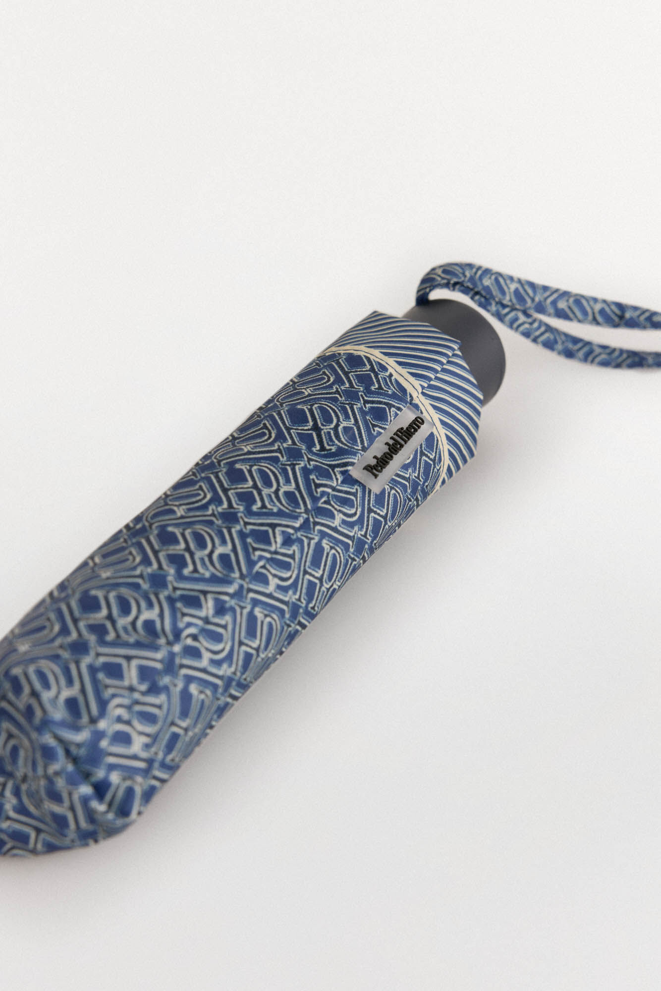 Pedro del Hierro Monogrammed umbrella with shoulder bag