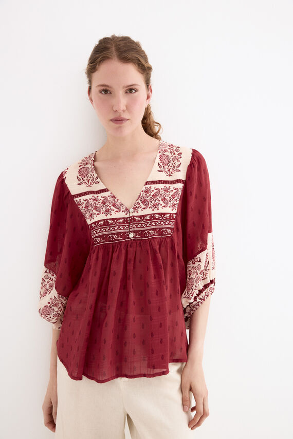 Blusa estampados combinados