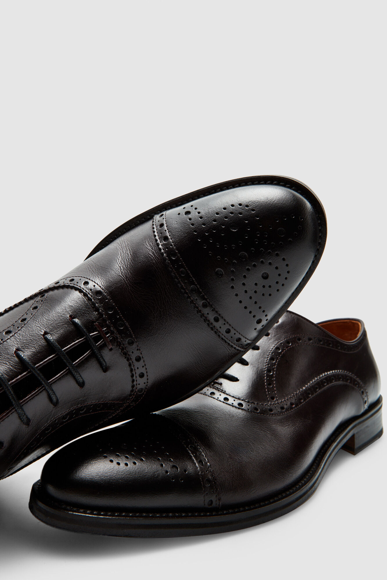 perforated dress shoes