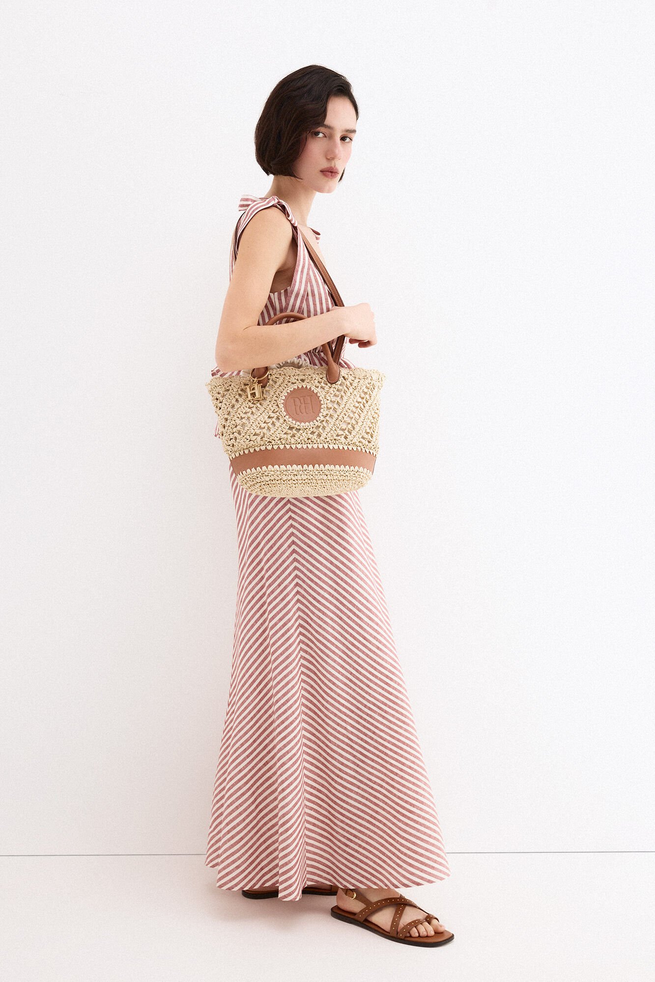 Pedro del Hierro Raffia-effect braided logo basket bag