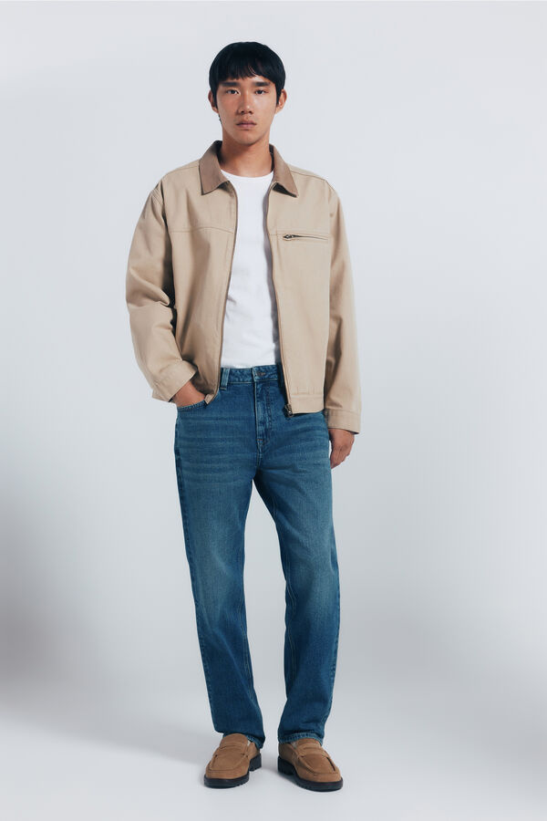 Springfield Calça jeans reta com lavagem escura e tingimento excessivo azul