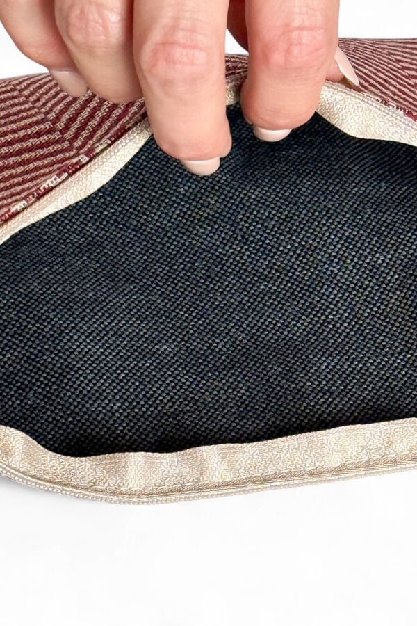 De La Mur Mala clutch Dubai estampado