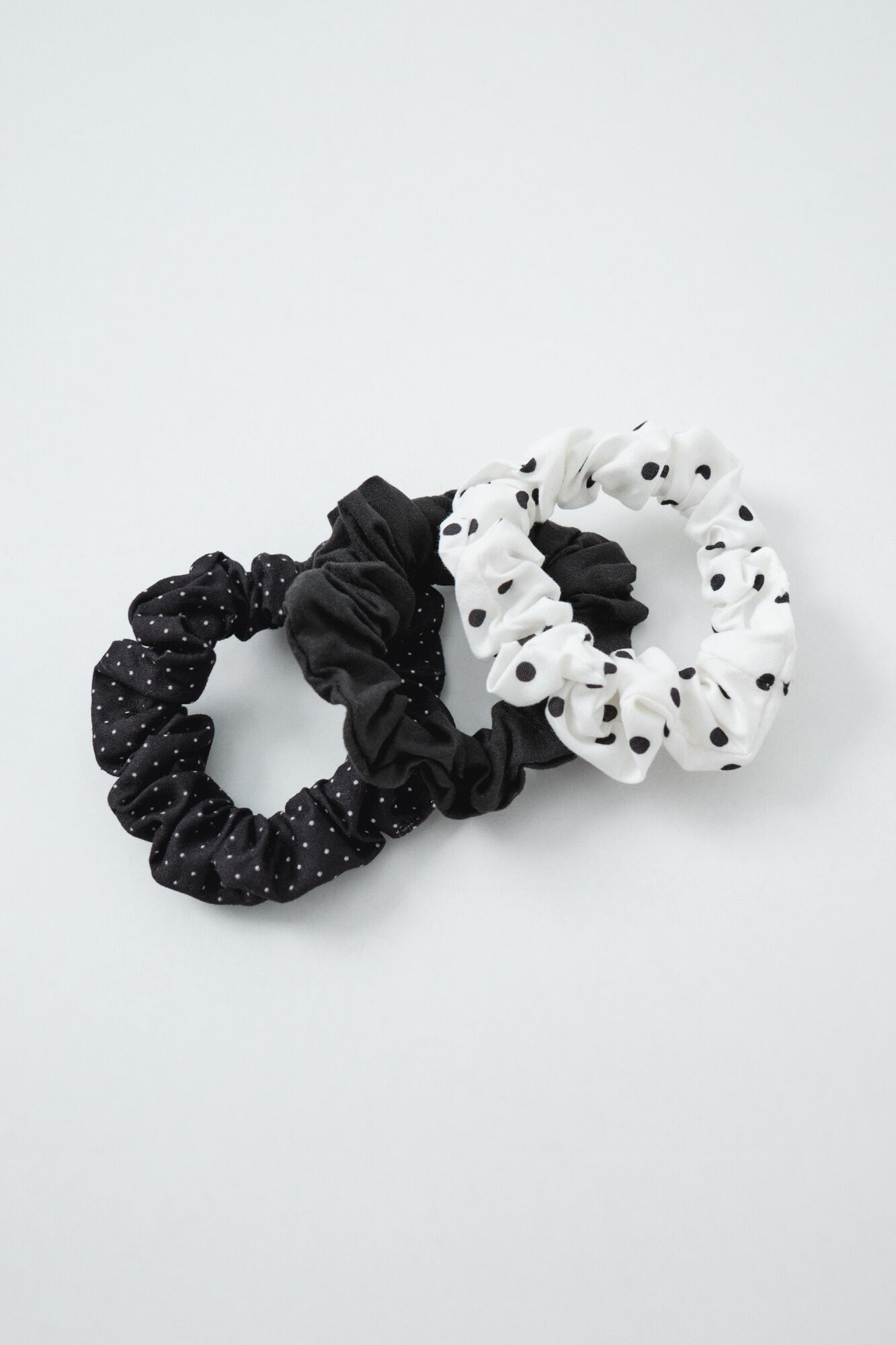 Women'secret Pack 3 el&aacute;sticos de cabelo bolinhas branco e preto