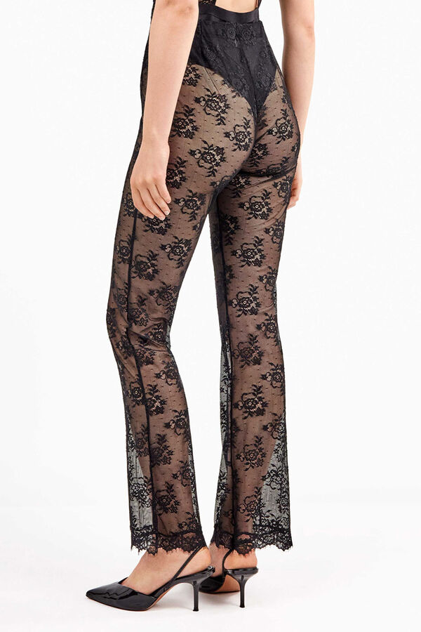 Gisela Pantalón largo elástico de encaje floral transparente y delicado negro