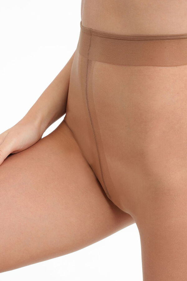 DIM Collant de verão Teint de Soleil transparente efeito natural cru