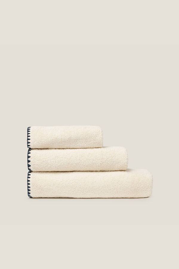 Textura Toalla baño pespunte marfil