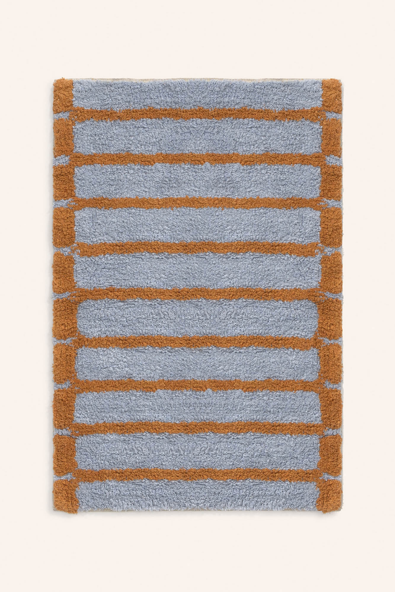 Calma House Tapete de banho &agrave;s riscas azul Saturno 50x70