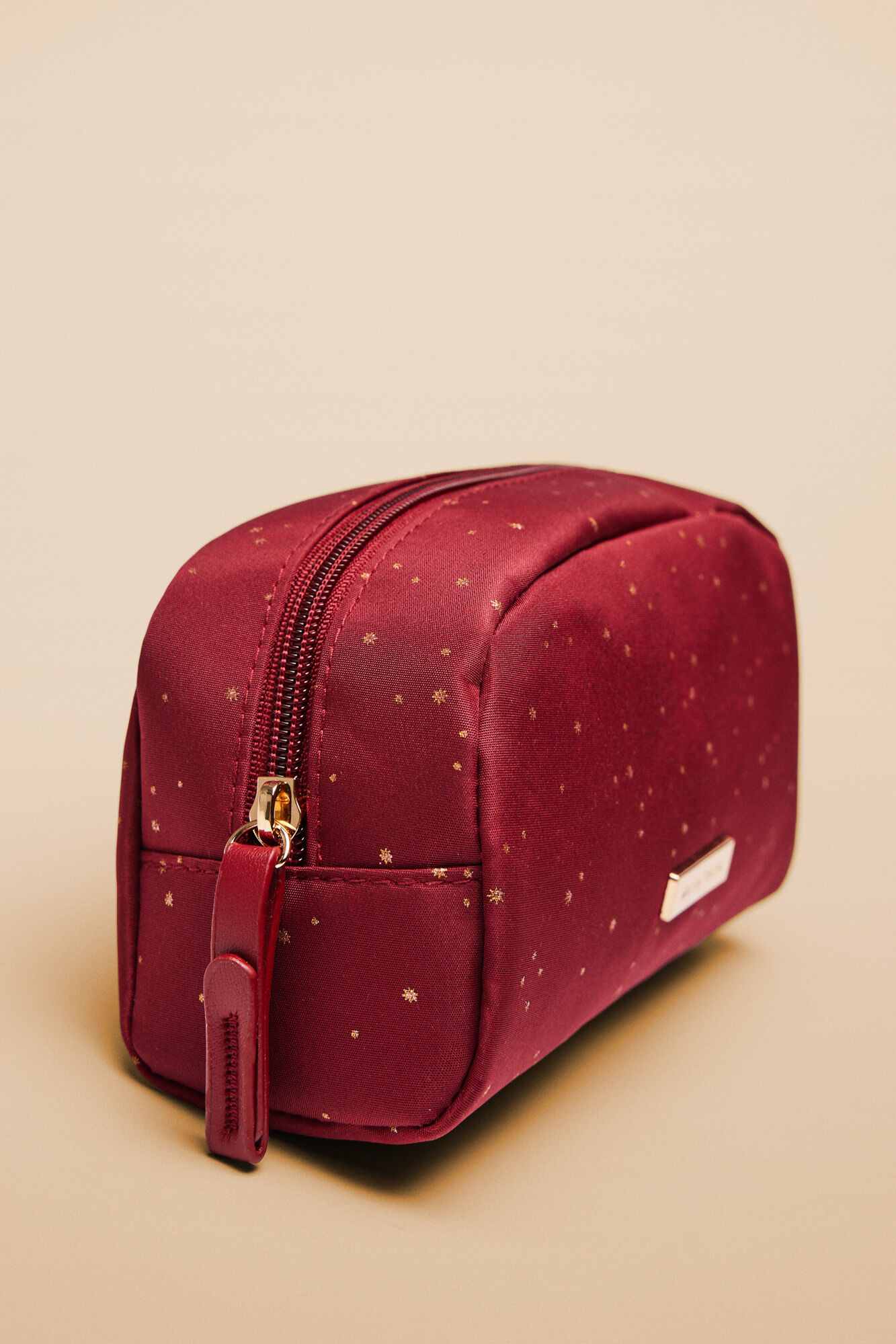 Small red vanity case with stars Women's accessories Cortefiel