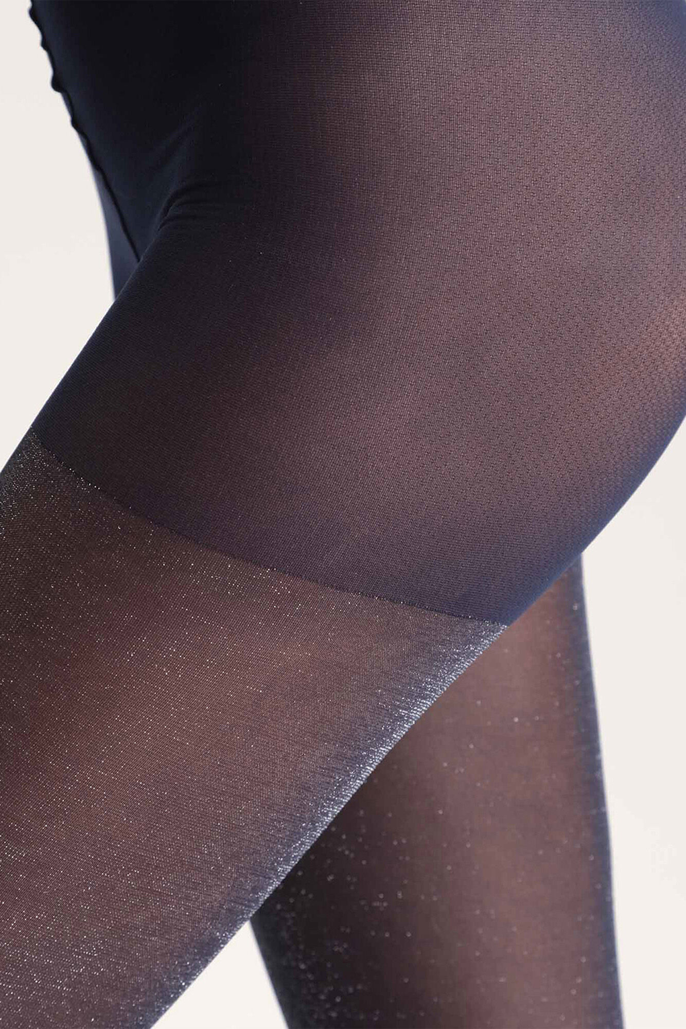 DIM Panty transparente con hilos brillantes 20 Deniers