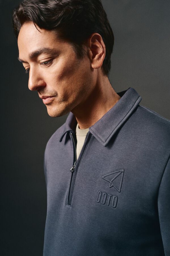 Conjunto de calças e sweatshirt