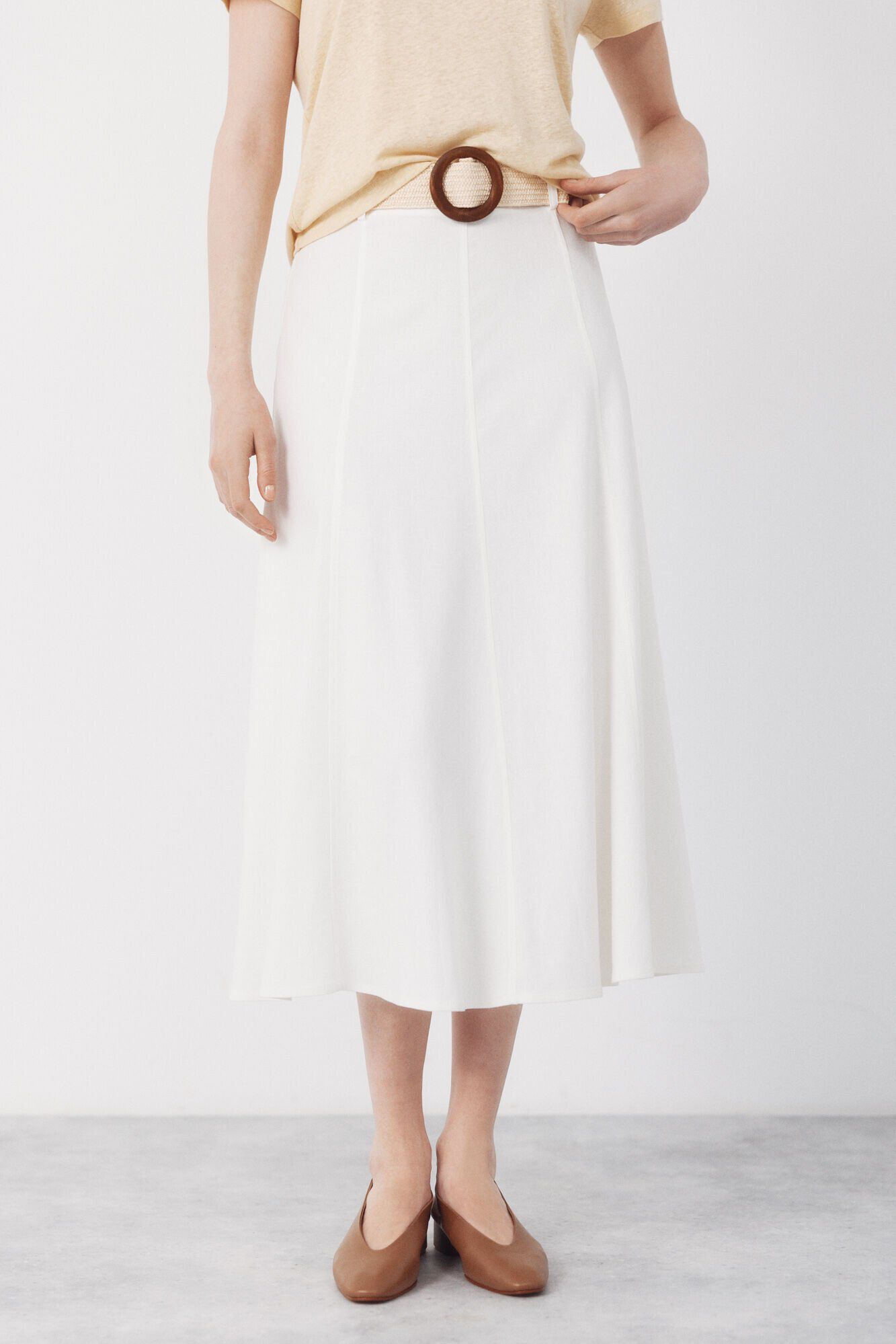 Conjunto de saia e colete